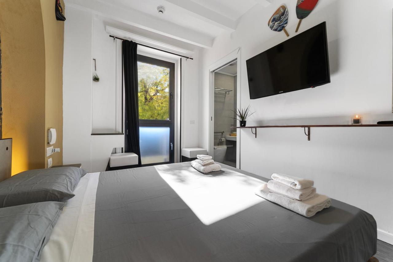 Ukiyo Suites And Rooms Кальяри Экстерьер фото